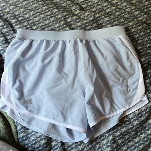 Loose fitting baby blue under armor running shorts